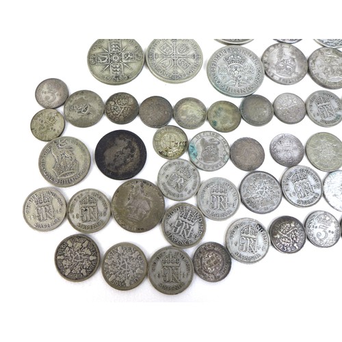 75 - A large collection of British coins, comprising coins with silver content thirteen post 1920 and pre... 