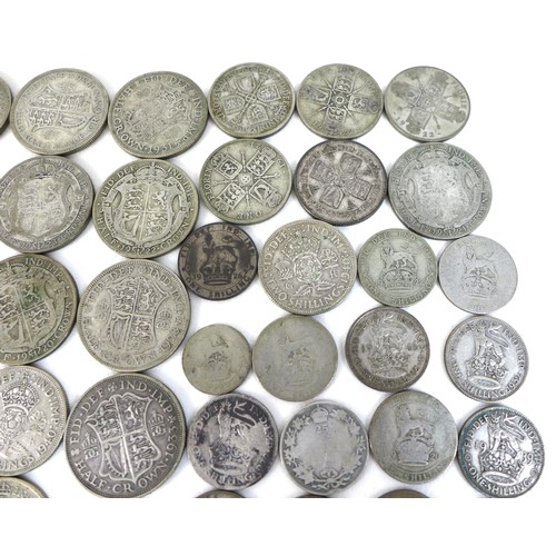 75 - A large collection of British coins, comprising coins with silver content thirteen post 1920 and pre... 