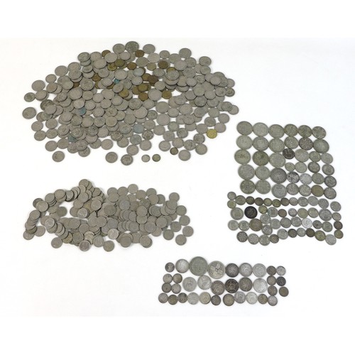 75 - A large collection of British coins, comprising coins with silver content thirteen post 1920 and pre... 