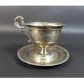 An early 19th century French silver cup with single lions head form handle and single stem circular ... 