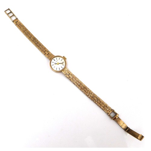 125 - A Bulova 9ct gold lady's wristwatch, circa 1984, reference 7193, with textured 9ct gold bracelet str... 