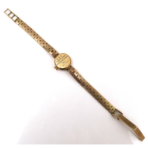 125 - A Bulova 9ct gold lady's wristwatch, circa 1984, reference 7193, with textured 9ct gold bracelet str... 