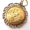 A Victoria Old Head gold sovereign, 1897, in a 9ct gold scroll pendant mount with 9ct gold chain, 13... 