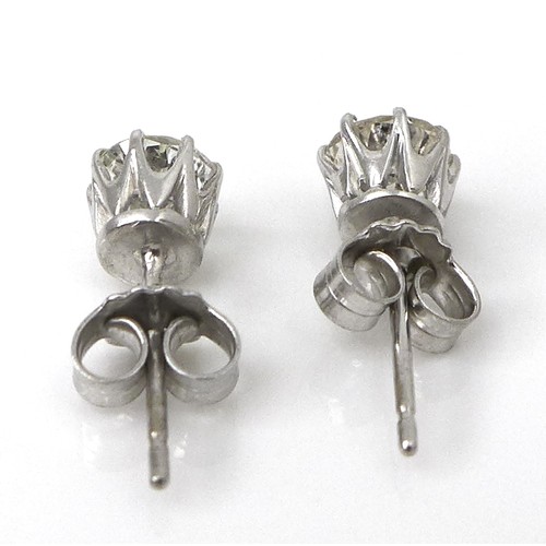 256 - A pair of diamond and 18ct white gold stud earrings, each of approximately 0.5ct, 1.8g.