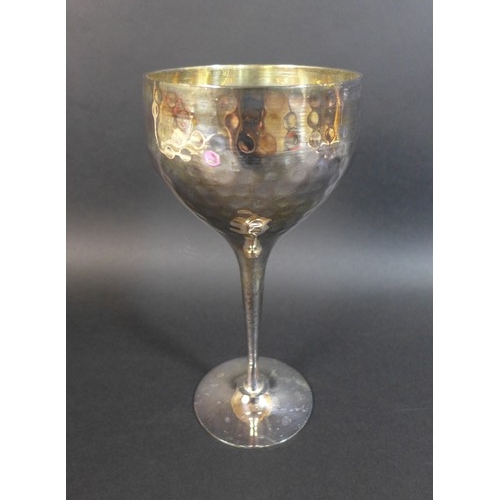 5 - Two pairs of Culinary Concepts silver plated wine goblets, with planished effect decoration, each 20... 