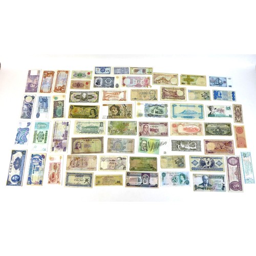 72 - A collection of 135 international bank notes, including, China, Poland Sweden, Cuba, Indonesia, Berl... 