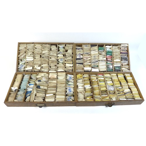 90 - A collection of watch parts, contained within an oak five drawer table top chest, comprising a large... 