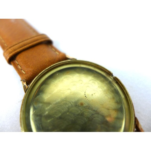 118 - A 14k gold cased Elco gentleman's wristwatch, circa 1960, circular silvered dial with gold batons, g... 