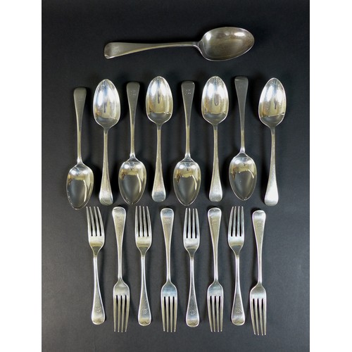 63 - A George V silver part suite of cutlery, Old English pattern, comprising serving spoon, 21.5cm, eigh... 