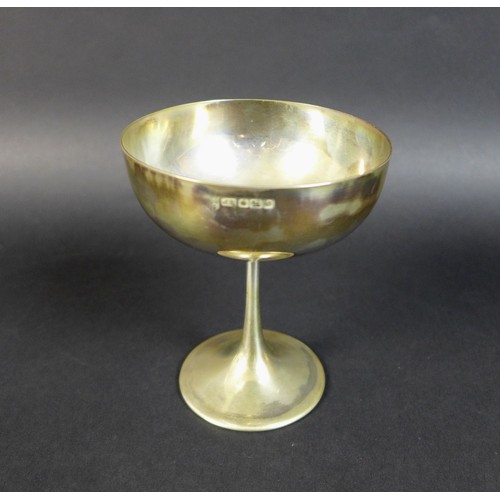 50 - A group of silver cups and tankards comprising a Victorian Goblet of classic chalice form with knopp... 