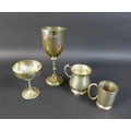 A group of silver cups and tankards comprising a Victorian Goblet of classic chalice form with knopp... 