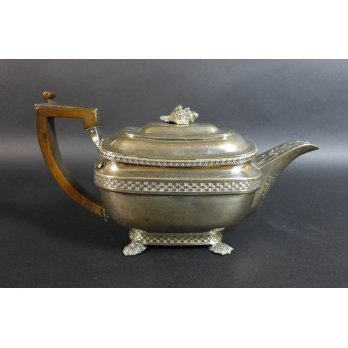 61 - A George III silver teapot and matching milk jug, of London shape with basket weave and stiff leaf b... 