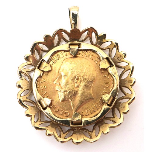 83 - A George V gold sovereign, 1914, in a 9ct gold mount, maker S&J, London 1975, 3.3cm, 13.2g total.