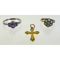 Three pieces of 9ct gold jewellery, comprising a 9ct white gold Tanzanite and diamond ring, the oval... 