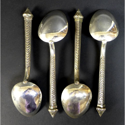 65 - A large collection of Cambodian Khmer silver serving utensils, comprising three graduated ladles, fo... 