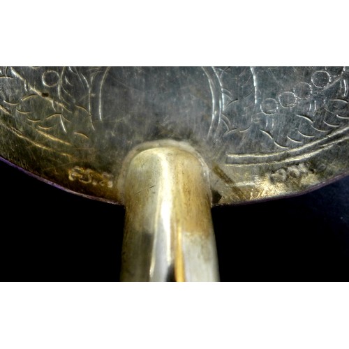 65 - A large collection of Cambodian Khmer silver serving utensils, comprising three graduated ladles, fo... 