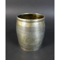 A George III silver christening tankard, of barrel form, single handle, engraved monogram possibly '... 