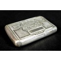 An early 19th century French 950 grade silver snuff box, with bright cut decoration to its lid  with... 