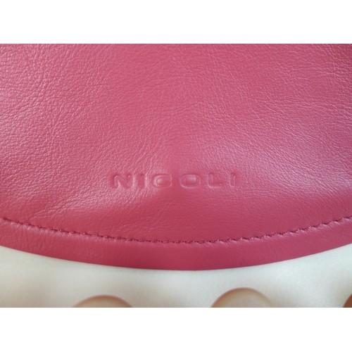 111 - A small Nicoli Italian leather handbag, in two-toned mushroom and pink colour, with detachable strap... 