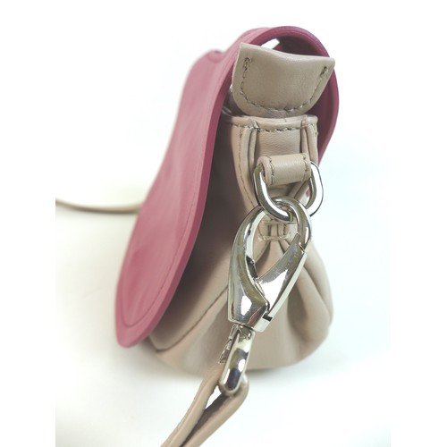 111 - A small Nicoli Italian leather handbag, in two-toned mushroom and pink colour, with detachable strap... 