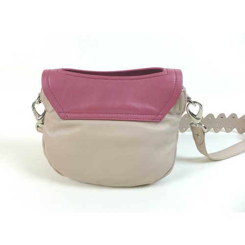 111 - A small Nicoli Italian leather handbag, in two-toned mushroom and pink colour, with detachable strap... 