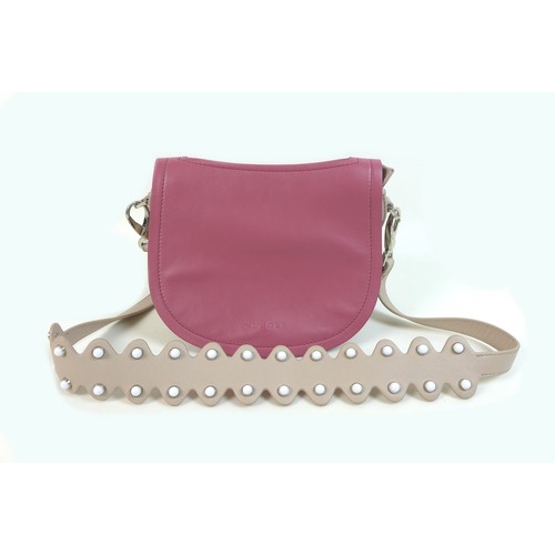 111 - A small Nicoli Italian leather handbag, in two-toned mushroom and pink colour, with detachable strap... 