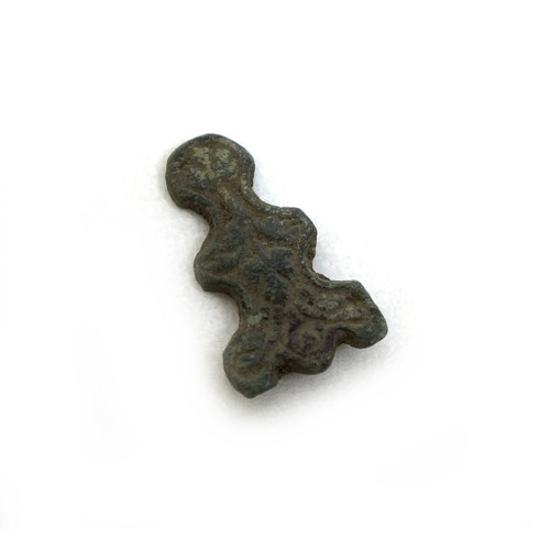 79 - A group of six Medieval and later detectorist finds, comprising a strap fitting, of subovate central... 