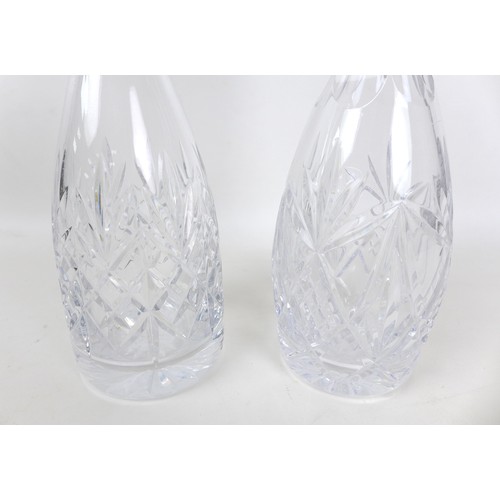 22 - A pair of Waterford Signature Goblets, 10062SW, boxed as new, together with two cut glass decanters ... 