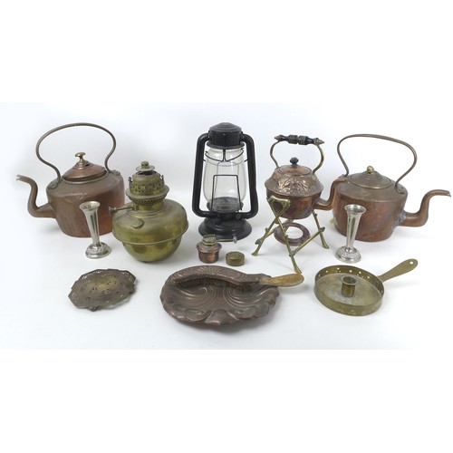 63 - A group of copper and brass items, including an embossed spirit kettle, burner and stand, kettle, 21... 