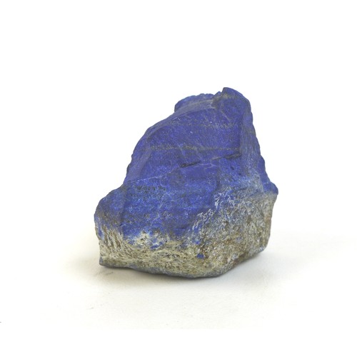 82 - A large piece of Lapis Lazuli, weighing over one kilo, of good ultramarine blue colour with some str... 