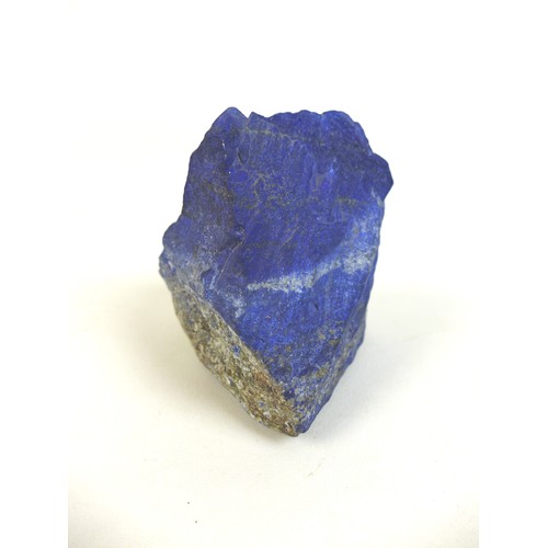 82 - A large piece of Lapis Lazuli, weighing over one kilo, of good ultramarine blue colour with some str... 