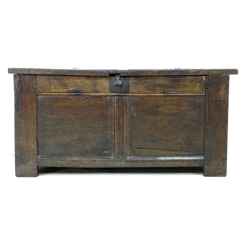 343 - An early 18th century oak blanket chest, with two panelled front and top, loop hinges, stile feet, 1... 