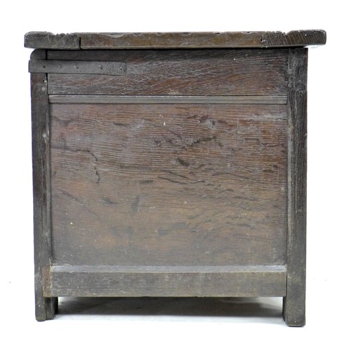 343 - An early 18th century oak blanket chest, with two panelled front and top, loop hinges, stile feet, 1... 