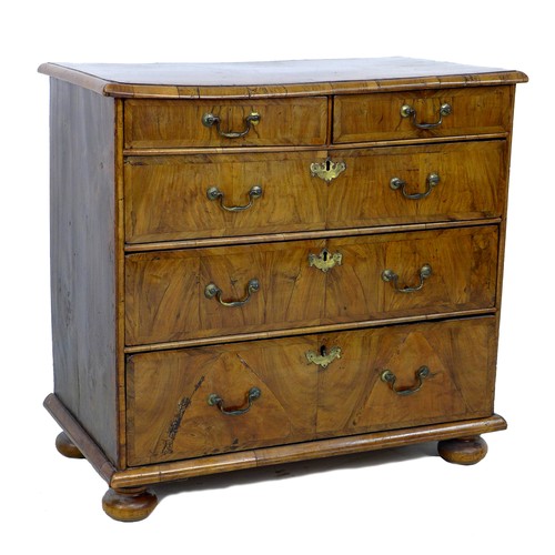 359 - A Queen Anne period, early 18th century, walnut veneered chest of two short over three long drawers,... 