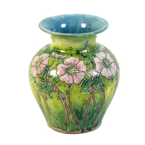 59 - An Arts & Crafts Della Robbia (1897-1906) pottery vase, circa 1900, of baluster form with flared rim... 
