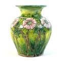 An Arts & Crafts Della Robbia (1897-1906) pottery vase, circa 1900, of baluster form with flared rim... 