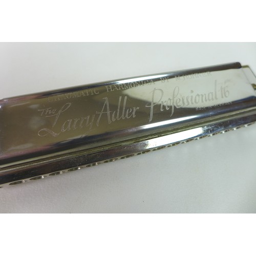 70 - A Hohner Larry Adler Professional 16 harmonica with case, together with a Wedgwood Royal Silver Jubi... 