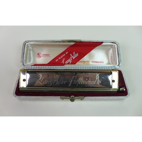 70 - A Hohner Larry Adler Professional 16 harmonica with case, together with a Wedgwood Royal Silver Jubi... 