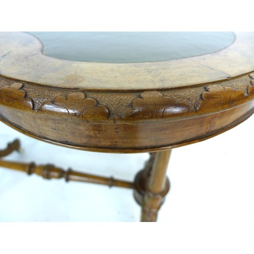 338 - A Victorian walnut kidney shaped table, with amended turned supports and shaped legs with castors, 9... 