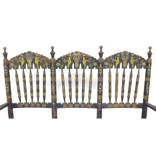 356 - A Spanish painted rush seated three seater settee, early 20th century, with shaped open arms and lad... 