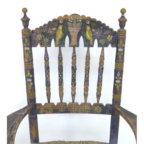 355 - A Spanish painted rush seated open armchair, early 20th century, with shaped open arms and ladder ba... 