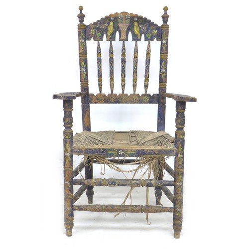 355 - A Spanish painted rush seated open armchair, early 20th century, with shaped open arms and ladder ba... 