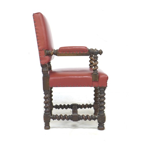 334 - A Victorian mahogany open armchair, in Jacobean style, later upholstered in red leather with padded ... 