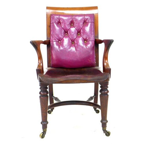 358 - A good Victorian mahogany office open armchair, with a purple buttoned leather back rest, shaped arm... 