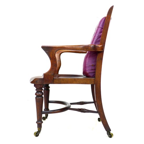 358 - A good Victorian mahogany office open armchair, with a purple buttoned leather back rest, shaped arm... 