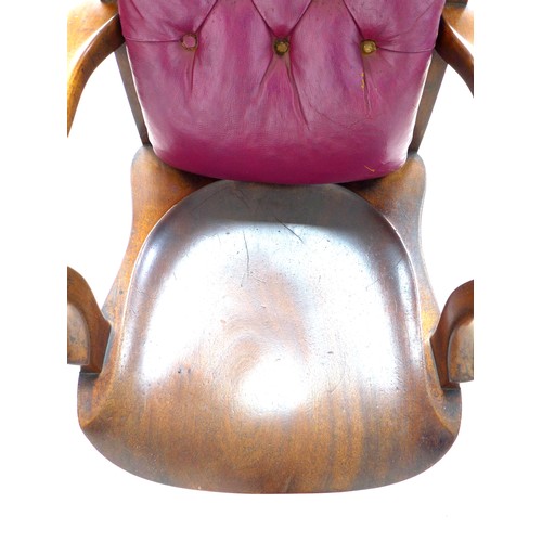 358 - A good Victorian mahogany office open armchair, with a purple buttoned leather back rest, shaped arm... 