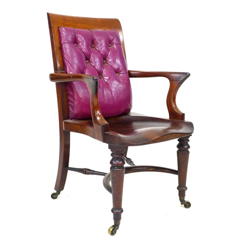 358 - A good Victorian mahogany office open armchair, with a purple buttoned leather back rest, shaped arm... 