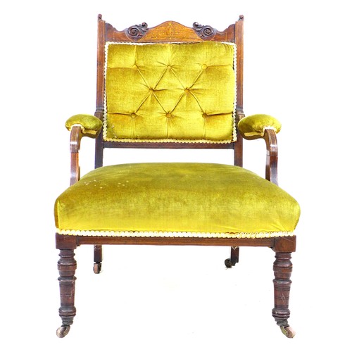 329 - A late Victorian open armchair, with carved and inlaid frame, upholstered in green gold velvet, padd... 