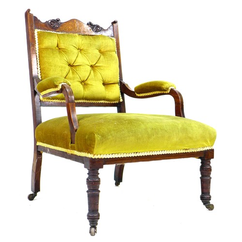 329 - A late Victorian open armchair, with carved and inlaid frame, upholstered in green gold velvet, padd... 