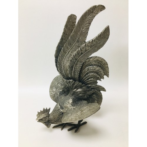 66 - A modern sculpture of an eagle, together with a silver plated metal sculpture of a fighting cock, an... 